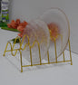 Metallic golden plates stand